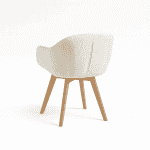 Elegant upholstered chair with wooden legs, modern design for living spaces.
